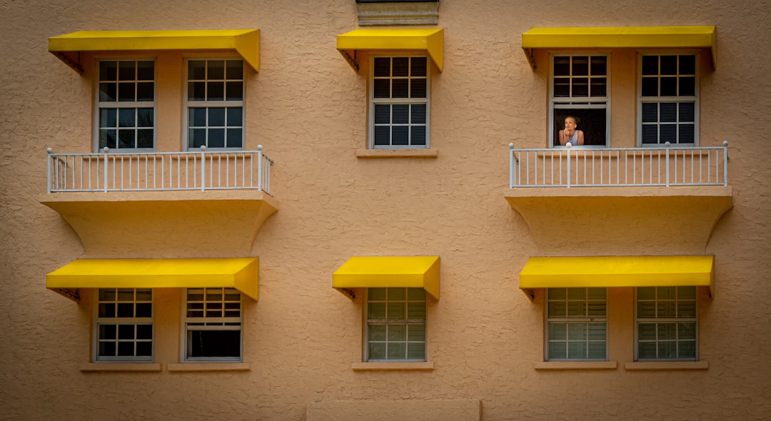 person in house window