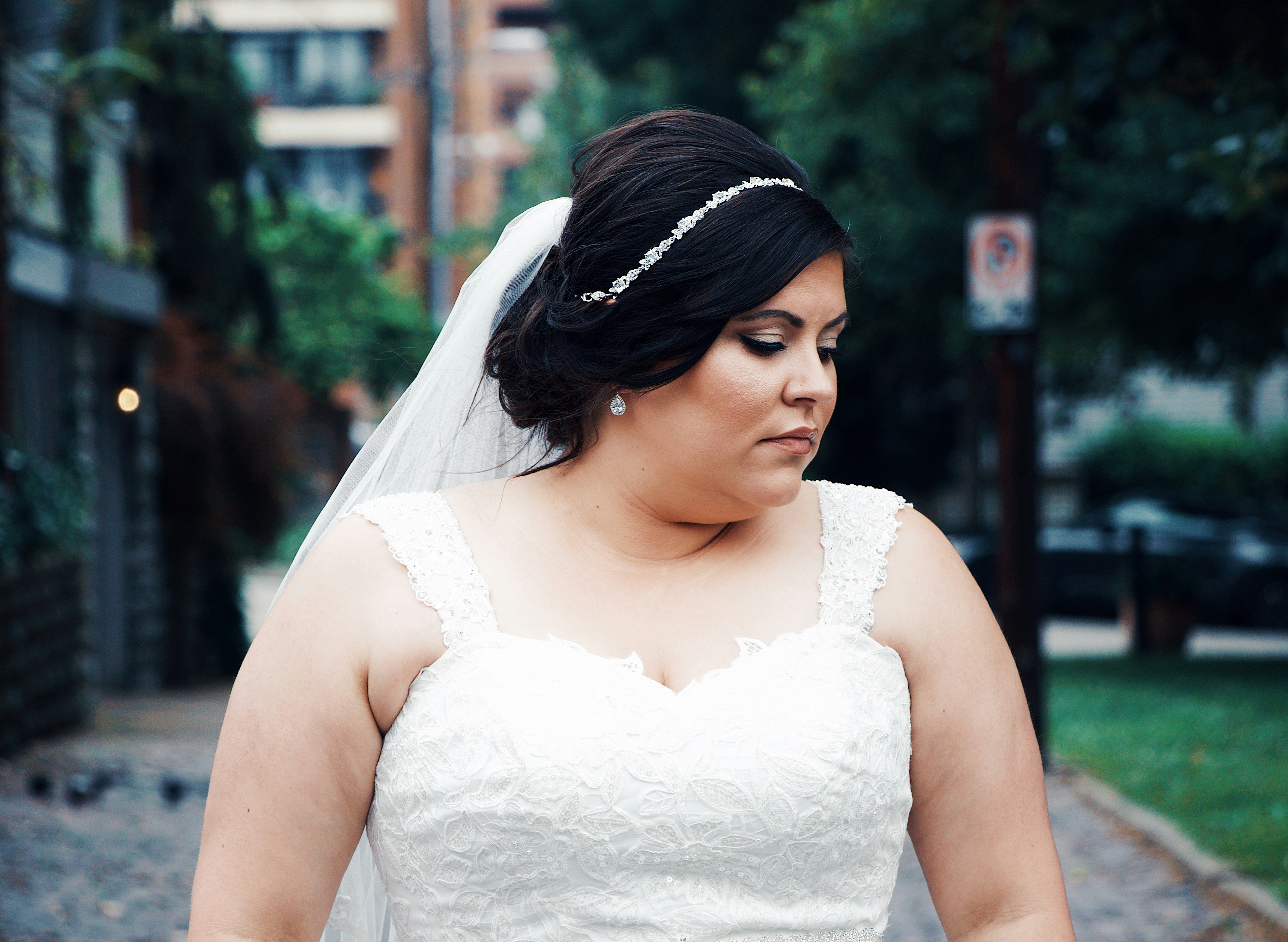 shallow focus photo of woman in white thick strap top