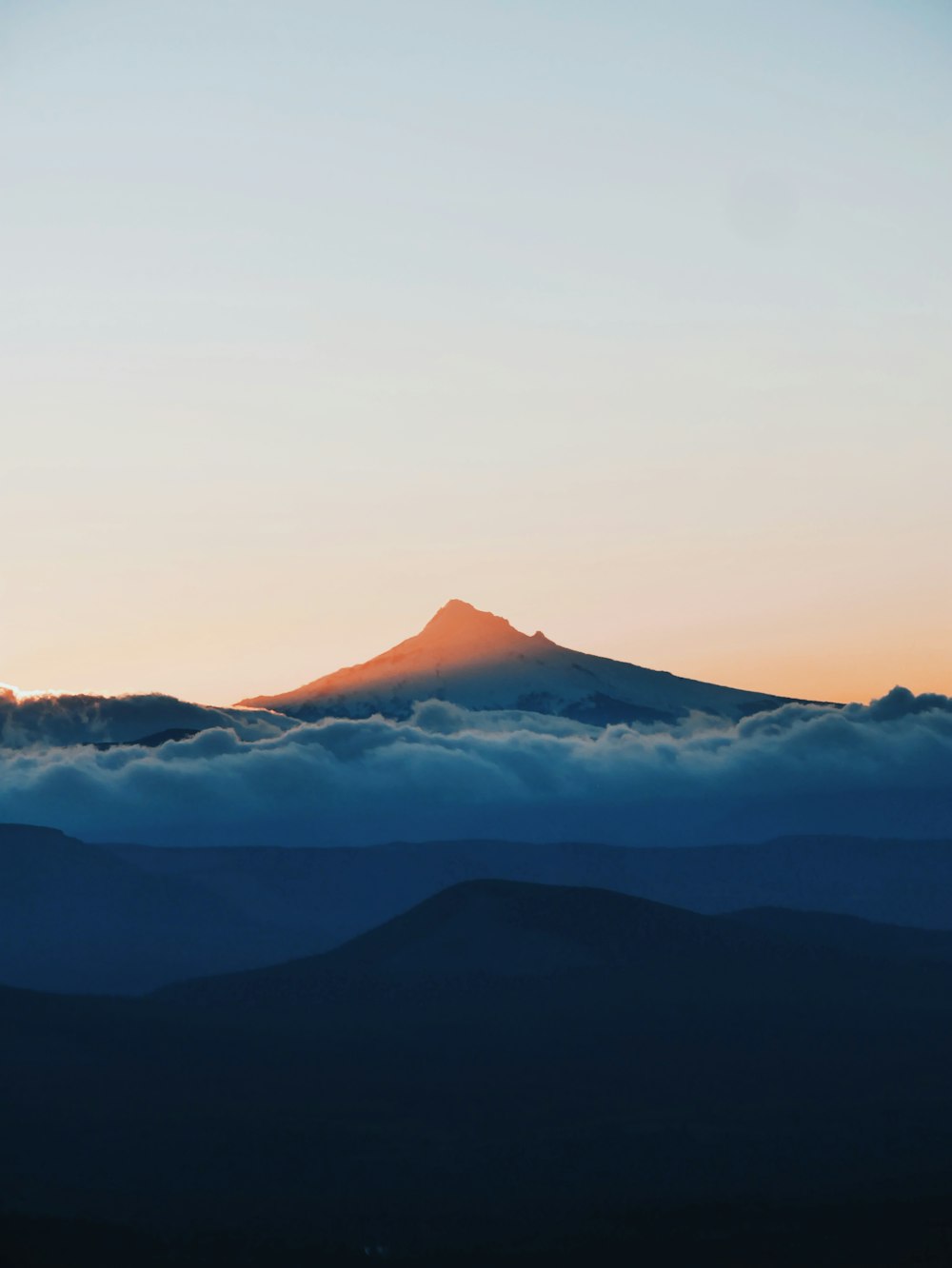 mountain under clouds