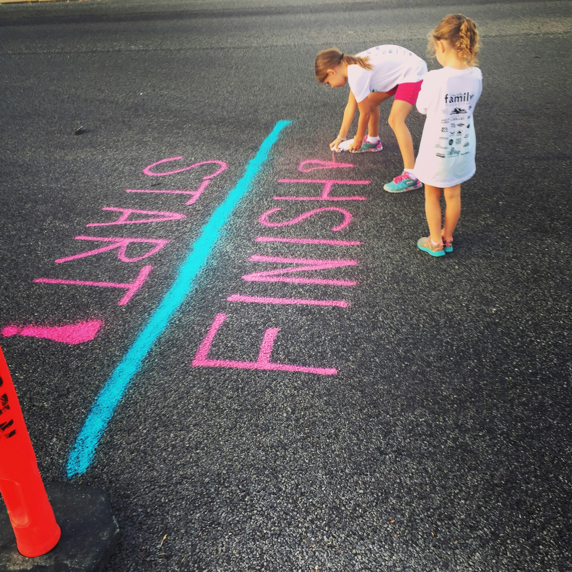 Two young girls mark a start/finish line using bright pink spray paint. Their efforts help get everything ready for a summertime 5k race in northern Utah. 

https://www.instagram.com/AwCreativeUT/

https://www.etsy.com/shop/AwCreativeUT

#AwCreativeUT #awcreative  