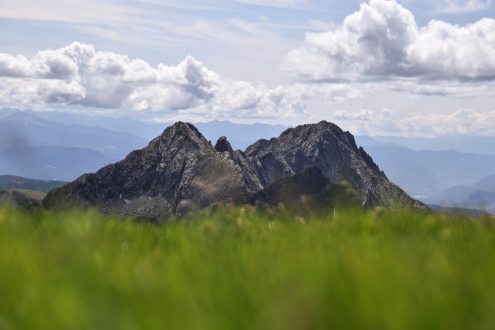 landscape photography of summit view mountain under white and blue sky