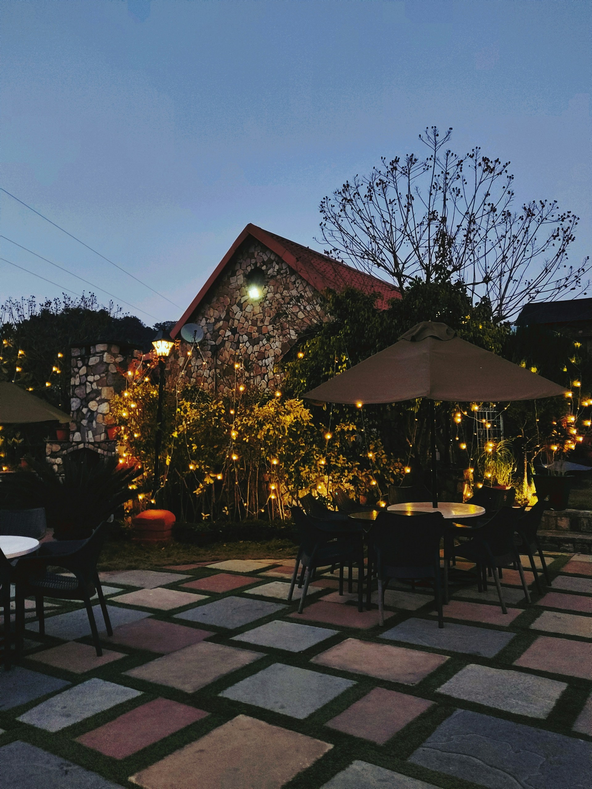woman wearing yellow long-sleeved dress under white clouds and blue sky during daytime