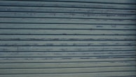 A close-up of garage door hardware and accessories.