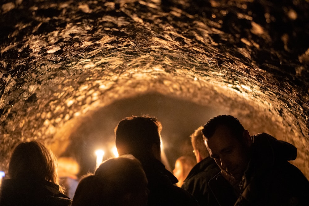 people inside cave