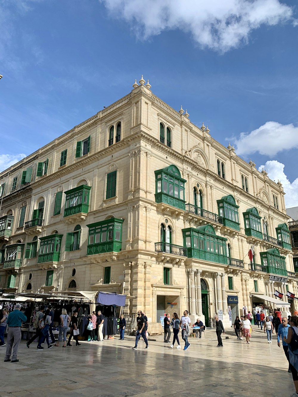 a group of people standing in front of a building