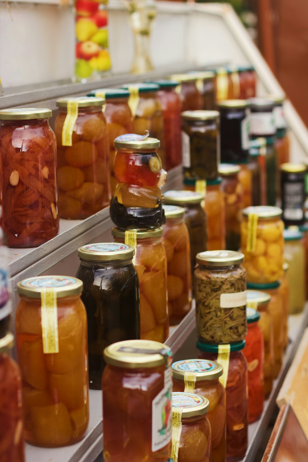assorted jars of foods on display rack