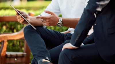 two people sitting during day