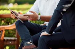 A professional consultant discussing nature-based solutions with corporate clients.