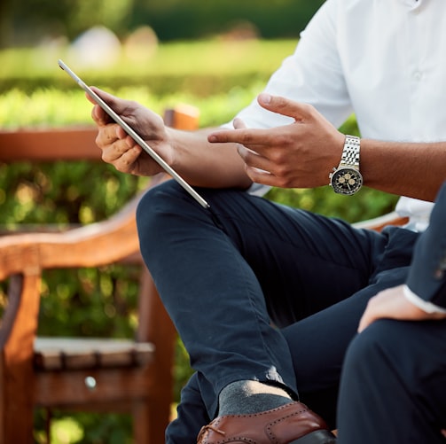 two people sitting during day