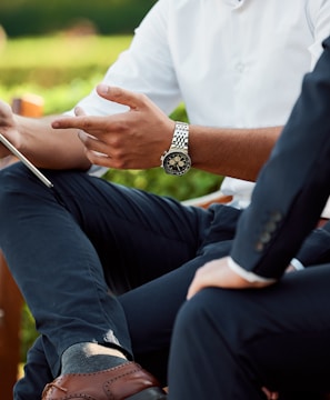 two people sitting during day