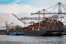 cargo ships docked at the pier during day