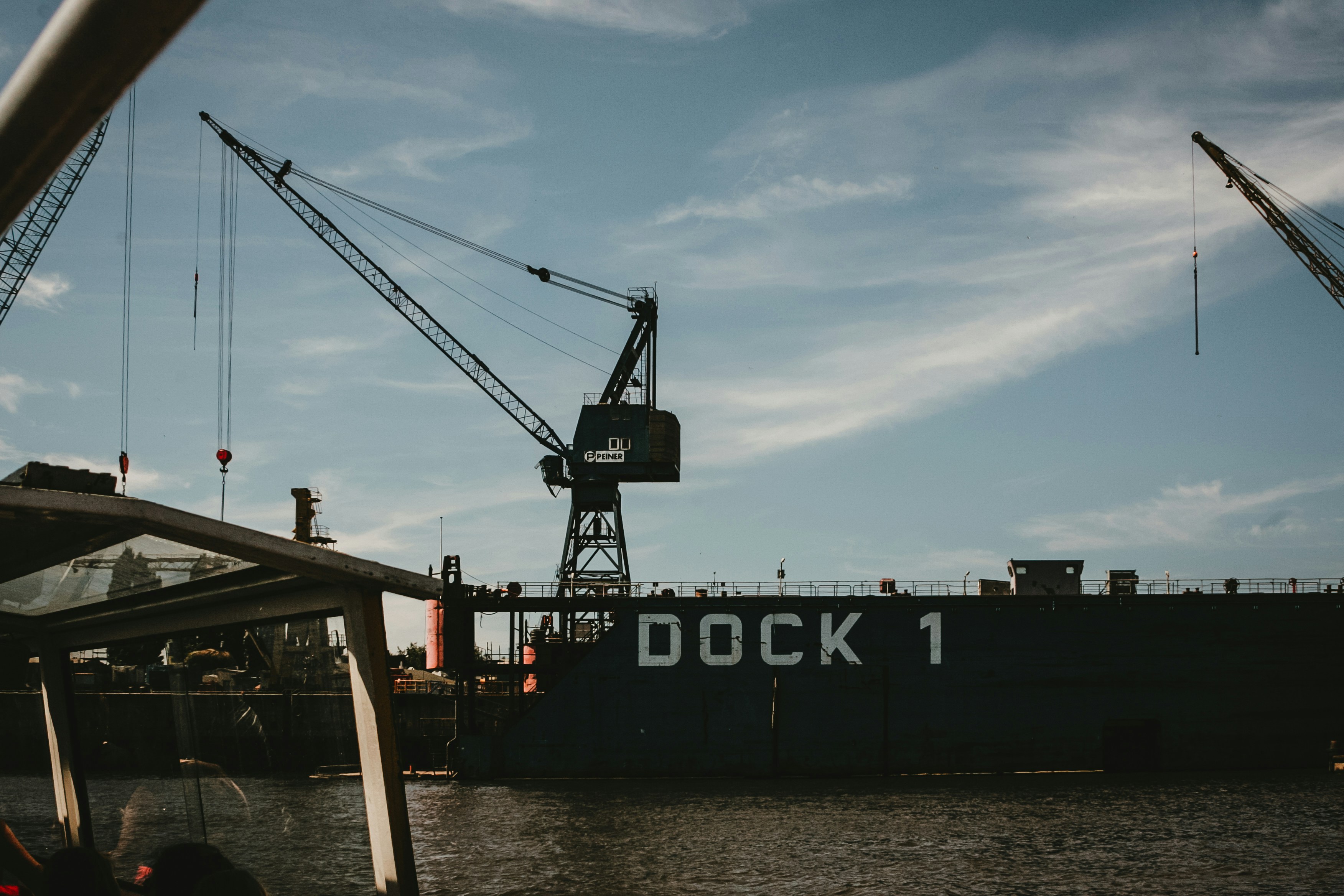 crane on pier during day