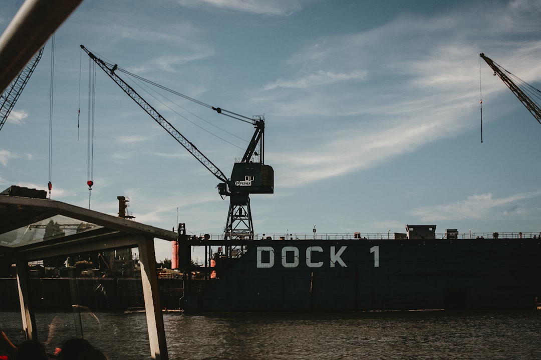 crane on pier during day