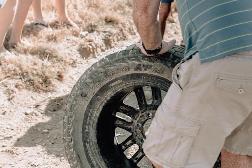 black bullet hole vehicle wheel and tire