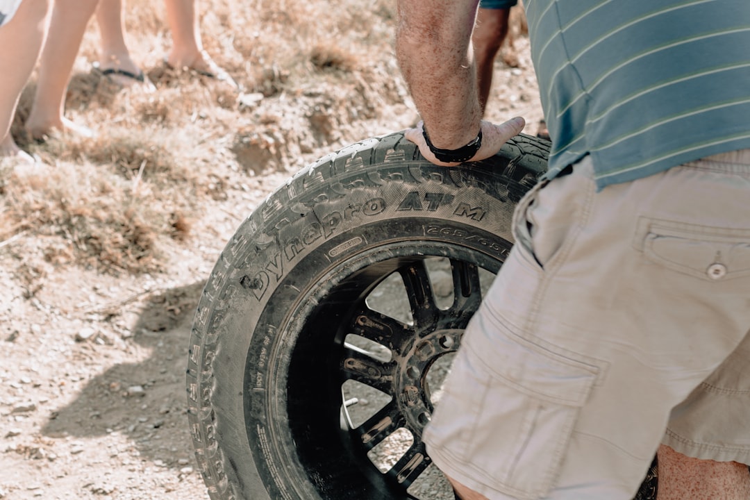 black bullet hole vehicle wheel and tire