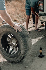 person holding vehicle wheel