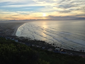 A stunning view of Sumbawa's coastline at sunset.