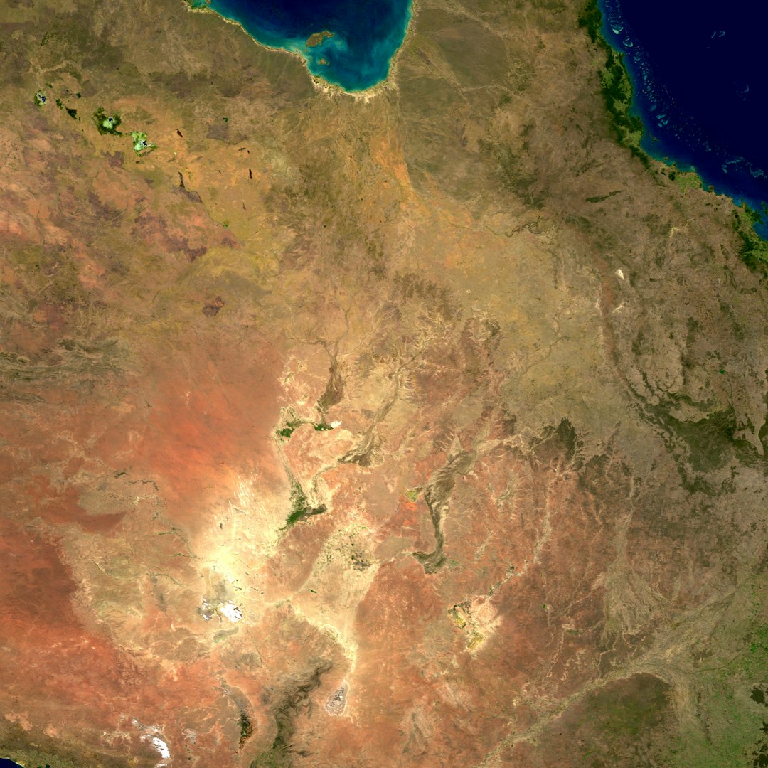 Australia is the smallest, and flattest, of all the continents. Its surface details are largely the result of erosion. Many rivers drain into the continent's harsh, arid interior, where they terminate in salt lakes that are dry for most of the year. Australia's coastal regions, however, are famous for astounding biodiversity, from the Great Barrier Reef in the northeast to Shark Bay in the west.