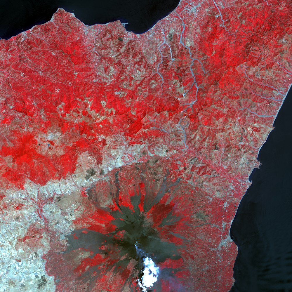 a satellite image of a red and white area