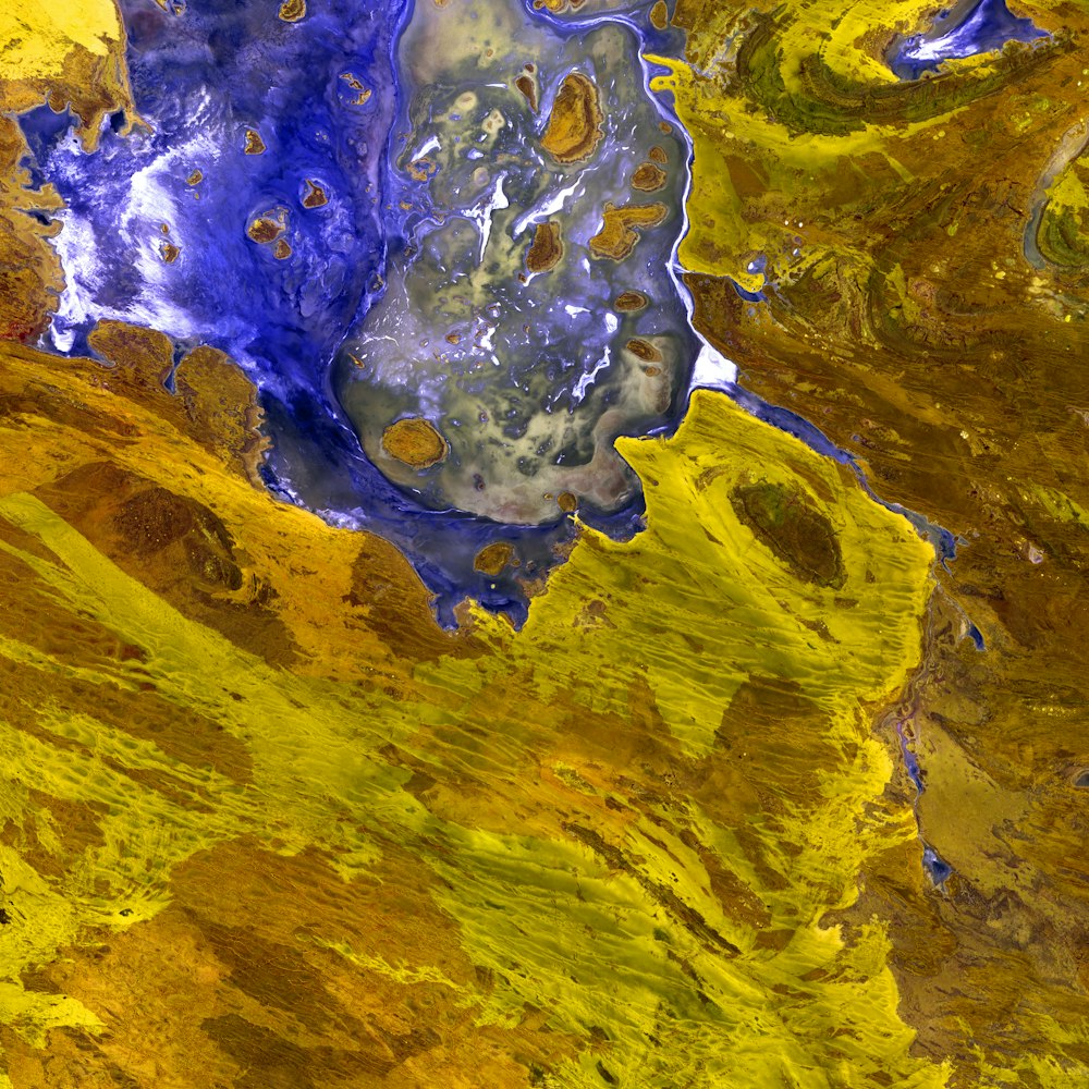 a close up of a yellow and blue substance