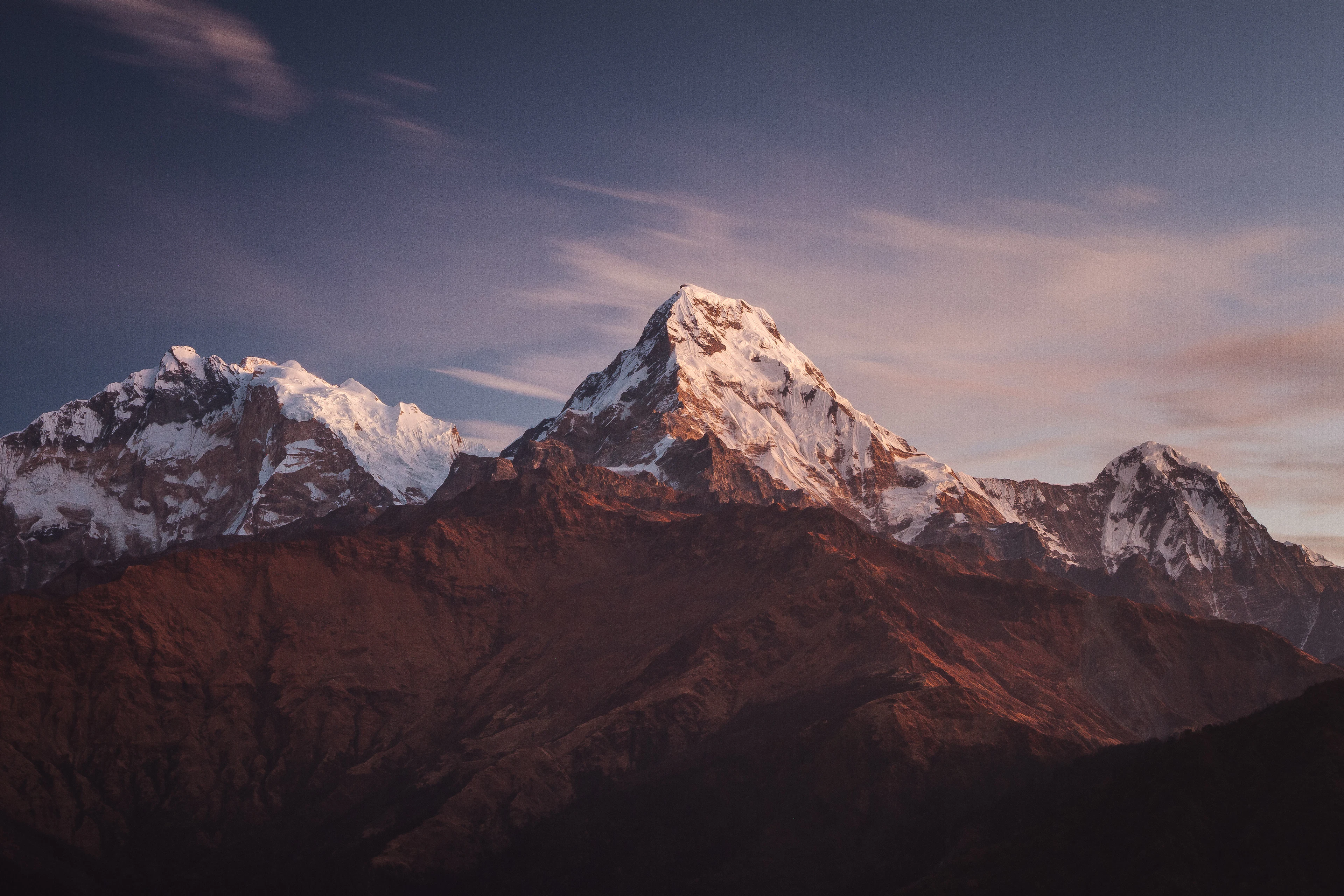 First light on the snow peaks of Annapurna I and Annapurna South, Nepal