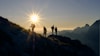 four person on mountain during daytime