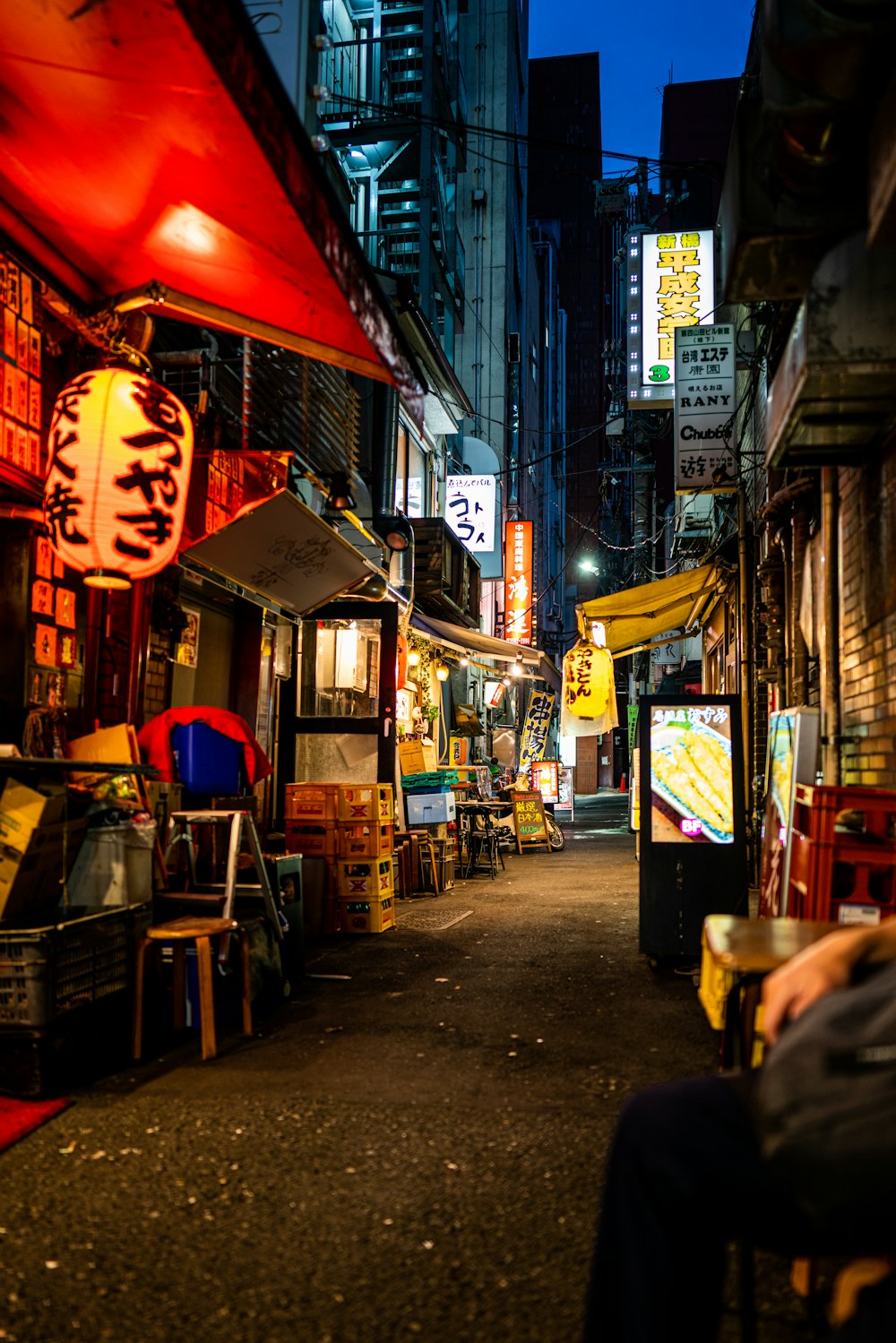 stalls on alley at night