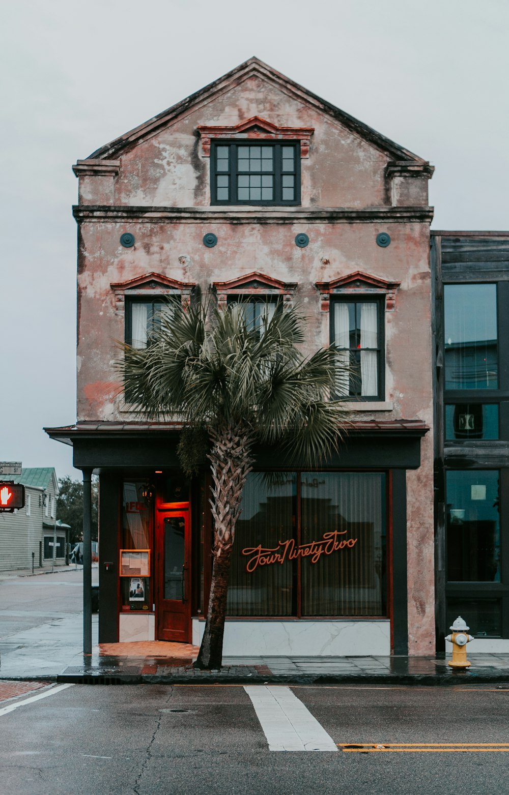 brown concrete building near road