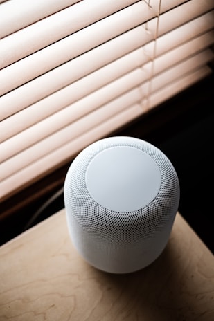 white portable speaker