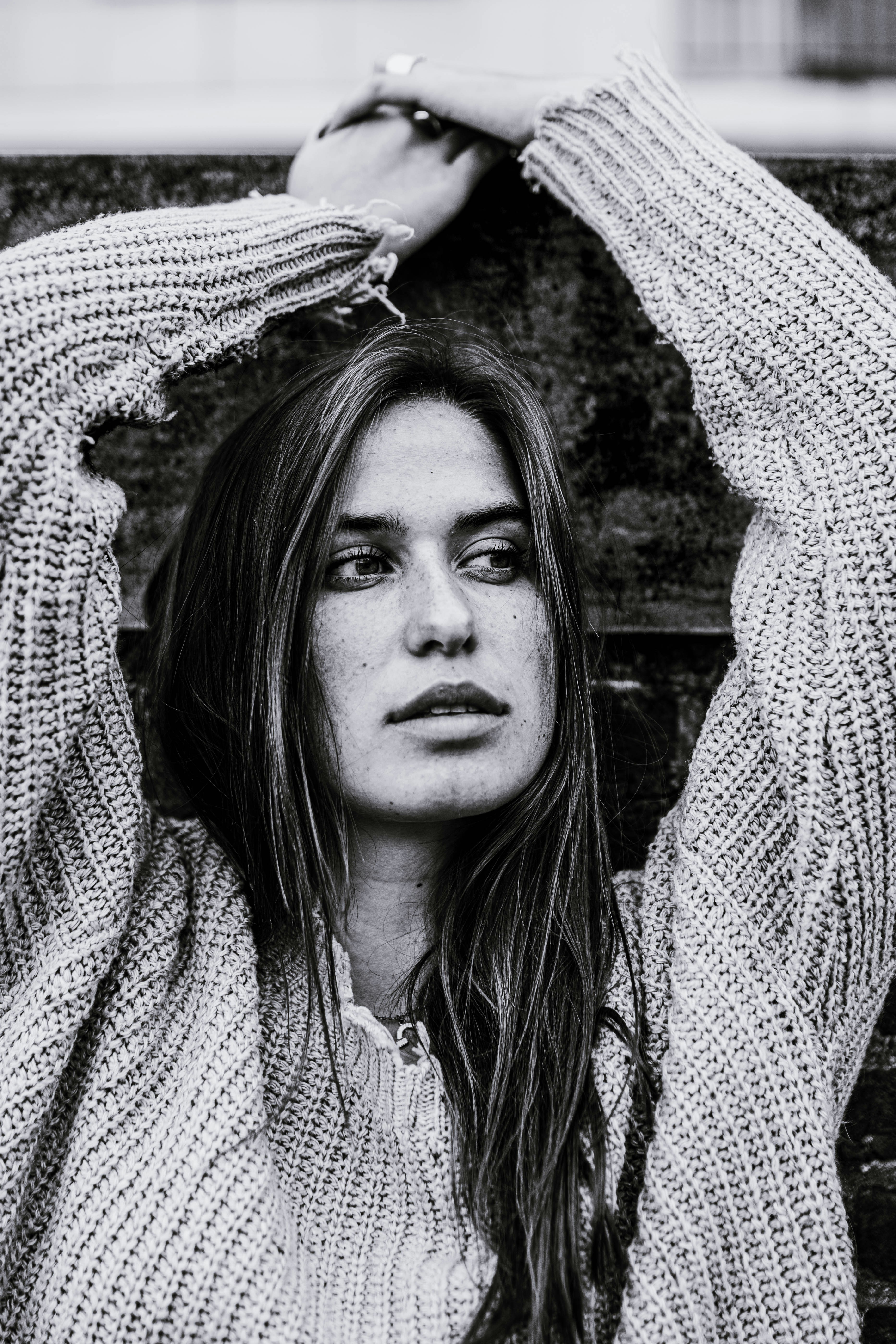grayscale photography of woman wearing sweater