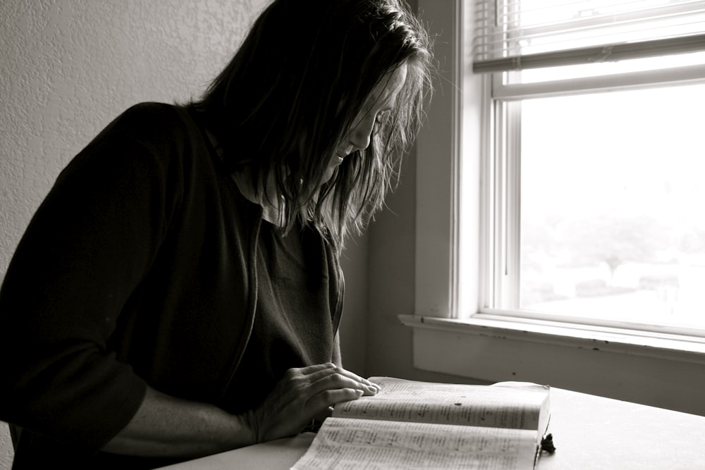 woman reading book