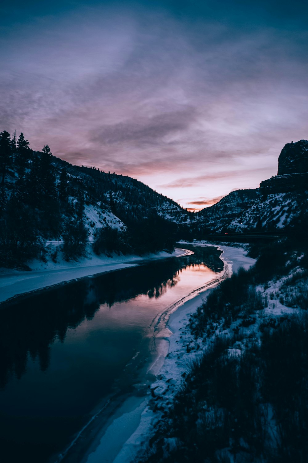 river and mountains during winter