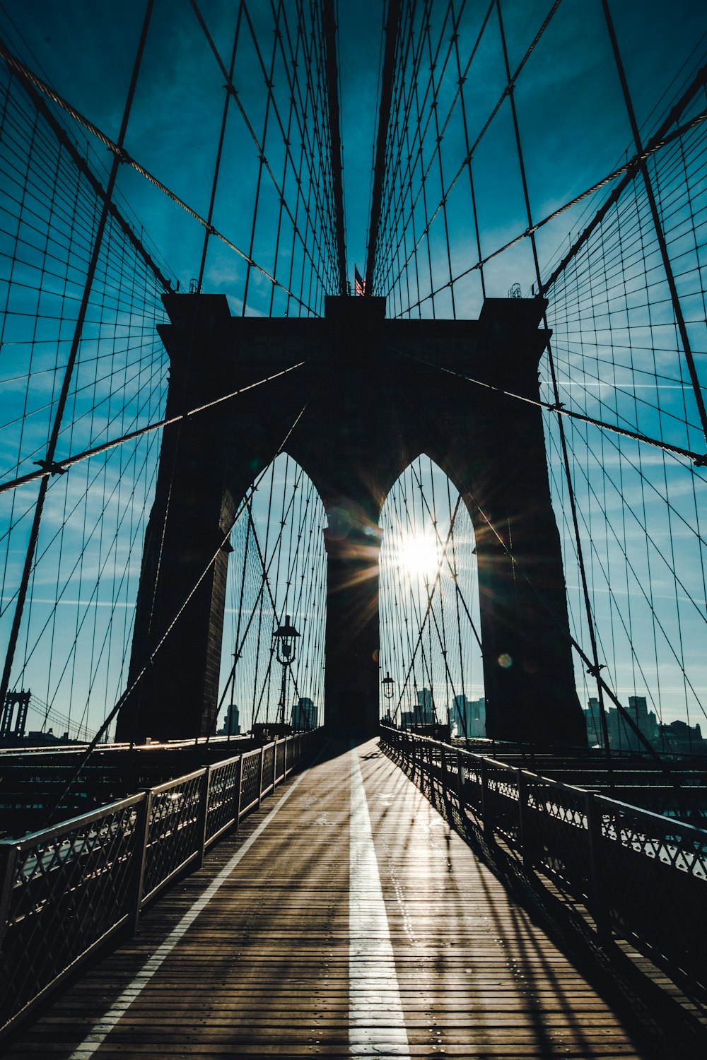 silhouette of bridge during daytime