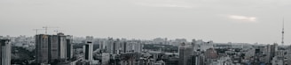 A panoramic view of a modern city skyline representing industrial and urban development.