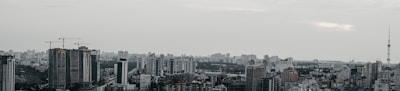 A panoramic view of a modern city skyline representing industrial and urban development.