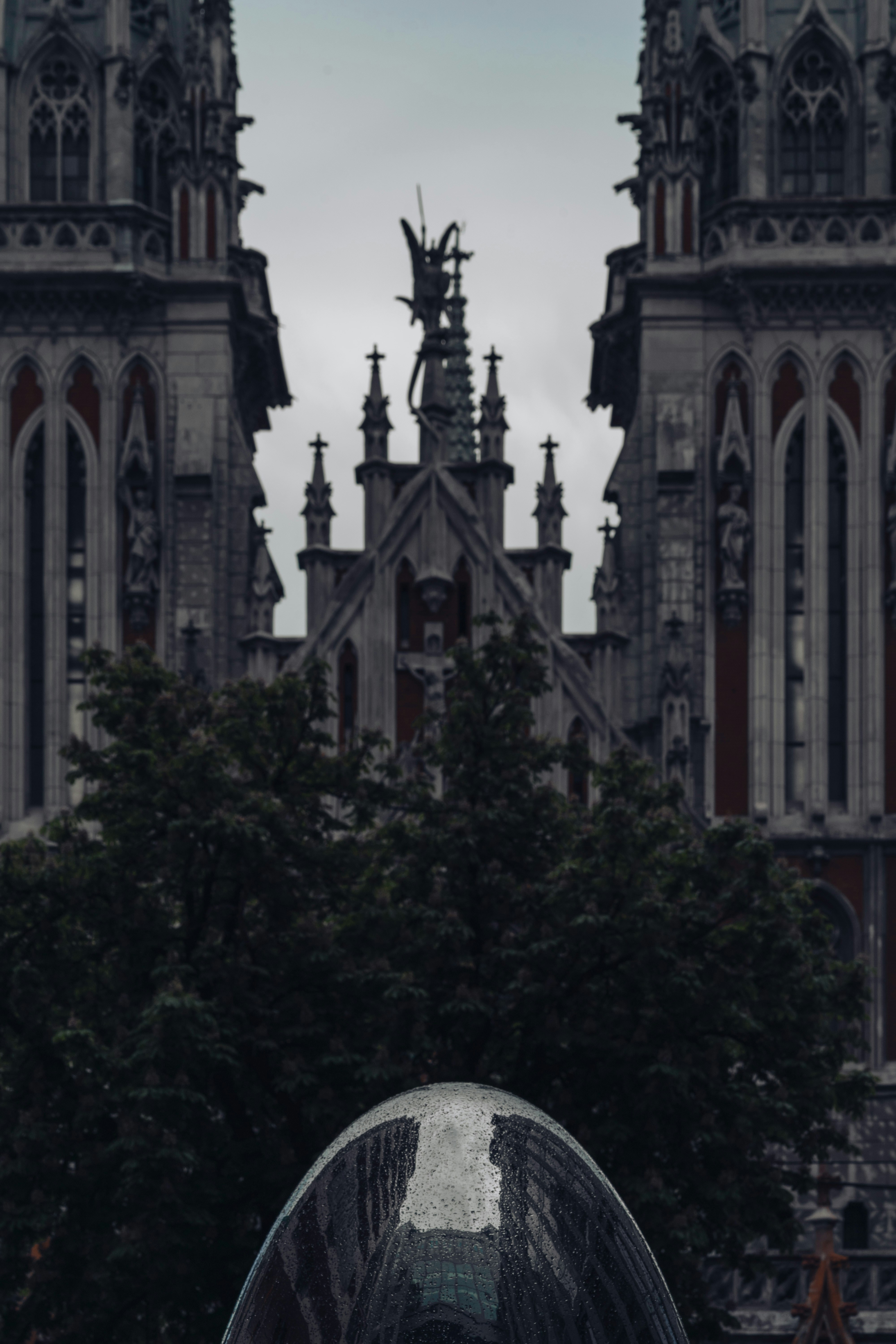 grayscale photography of building with towers