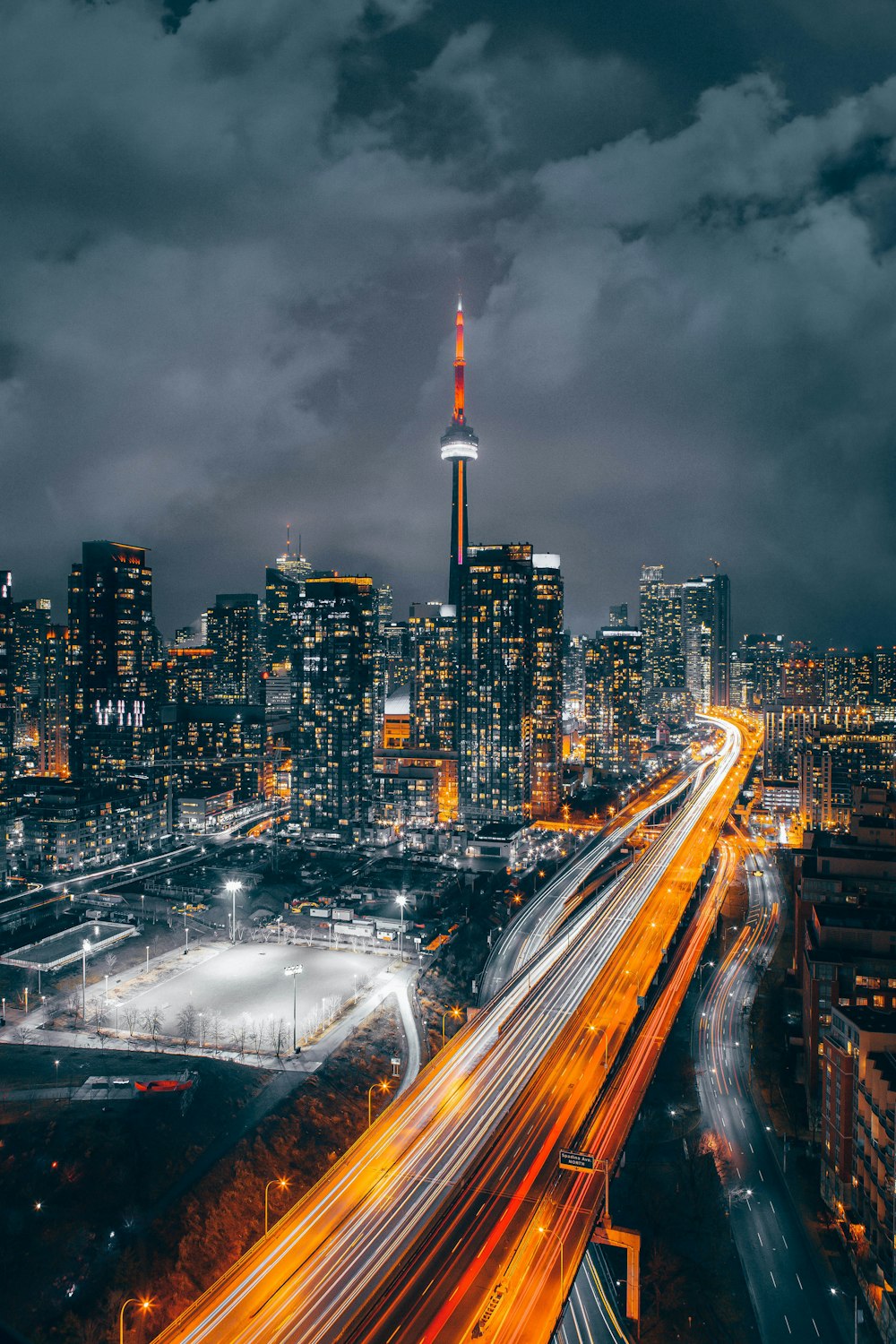 timelapse photography of road and buildings during nighttime