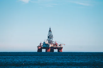 an oil rig in the middle of the ocean