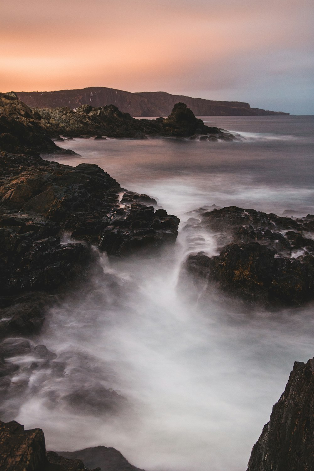 time lapse photography of water and rocks