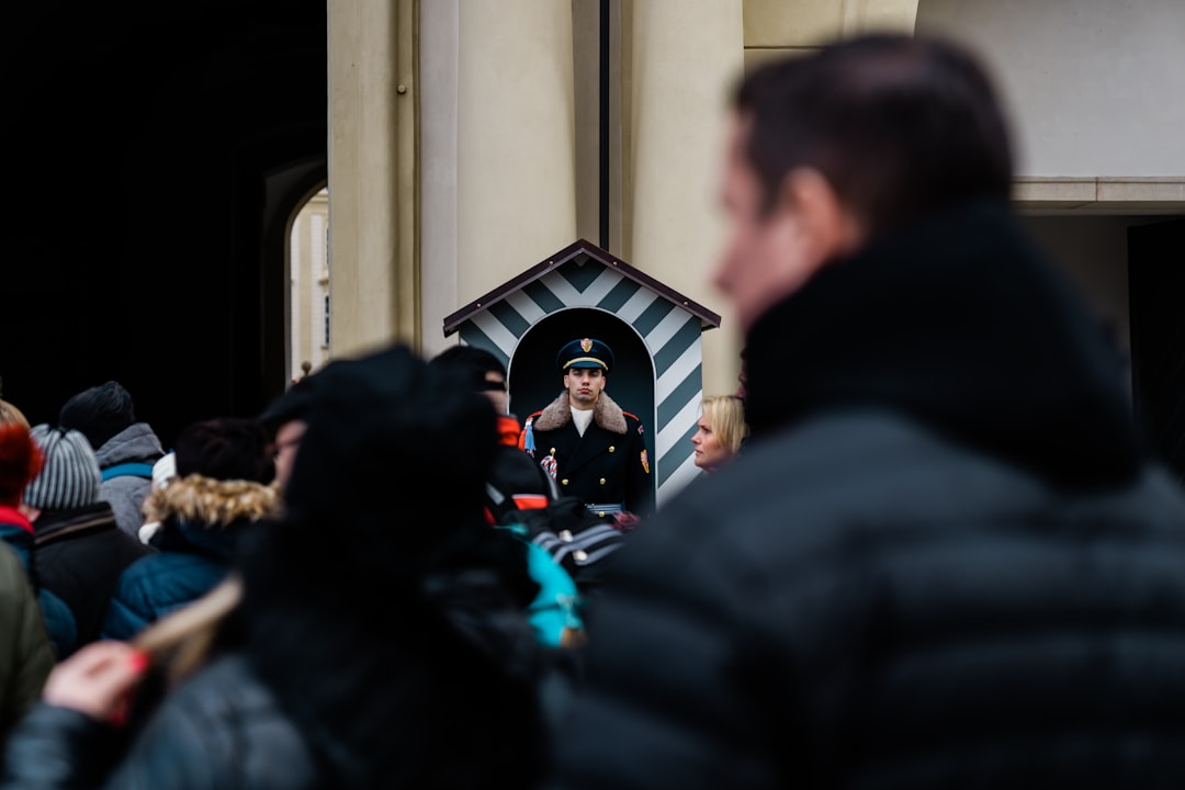 man wearing bubble hoodie jacket, Prague Castle Guard.