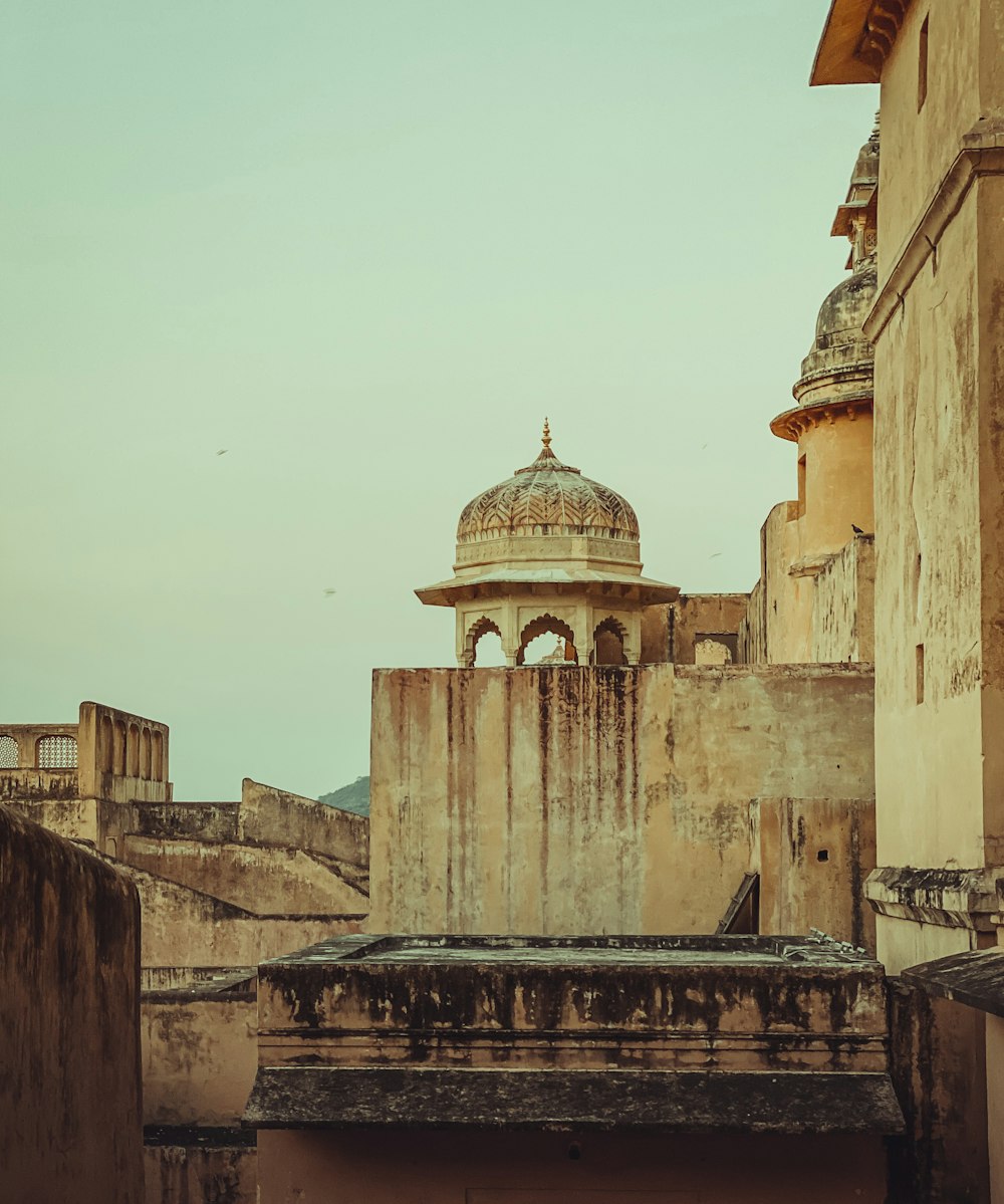 an old building with a dome on top of it