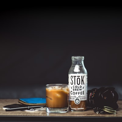 Stok cold brew coffee bottle and drinking glass