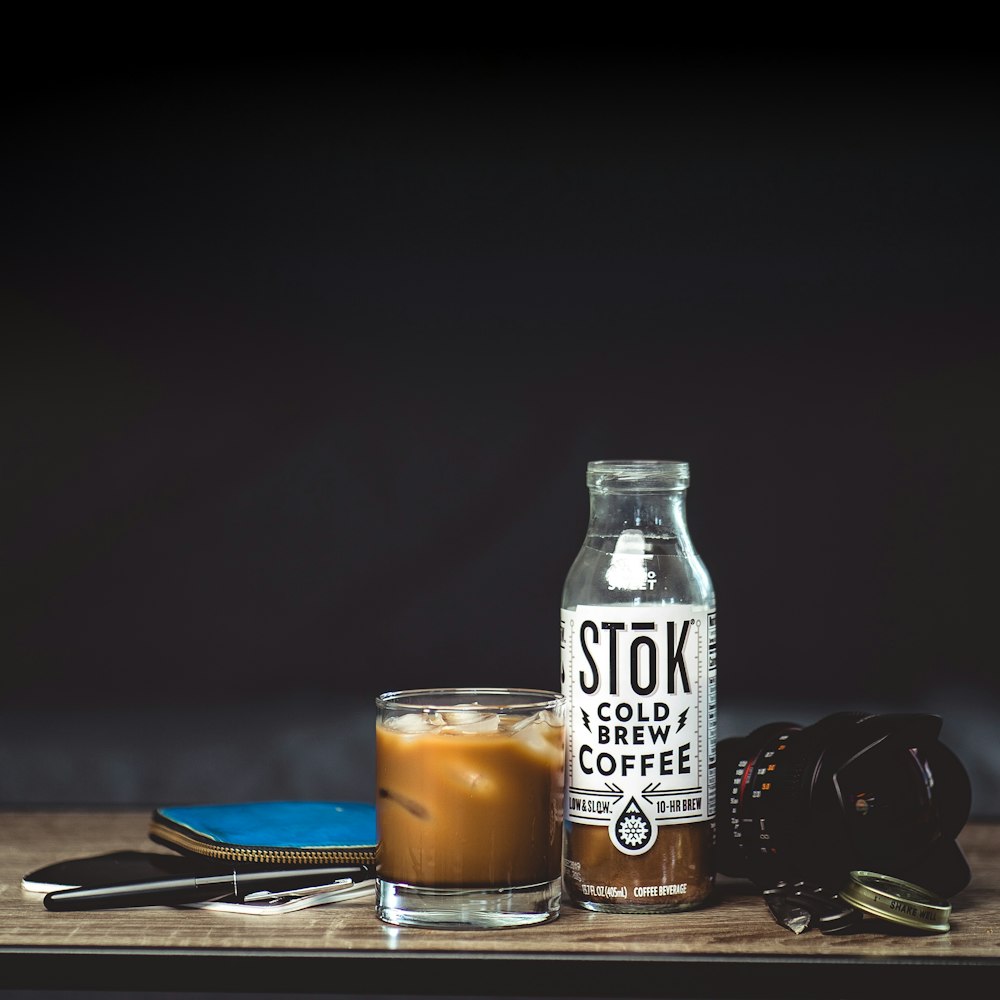 Stok cold brew coffee bottle and drinking glass