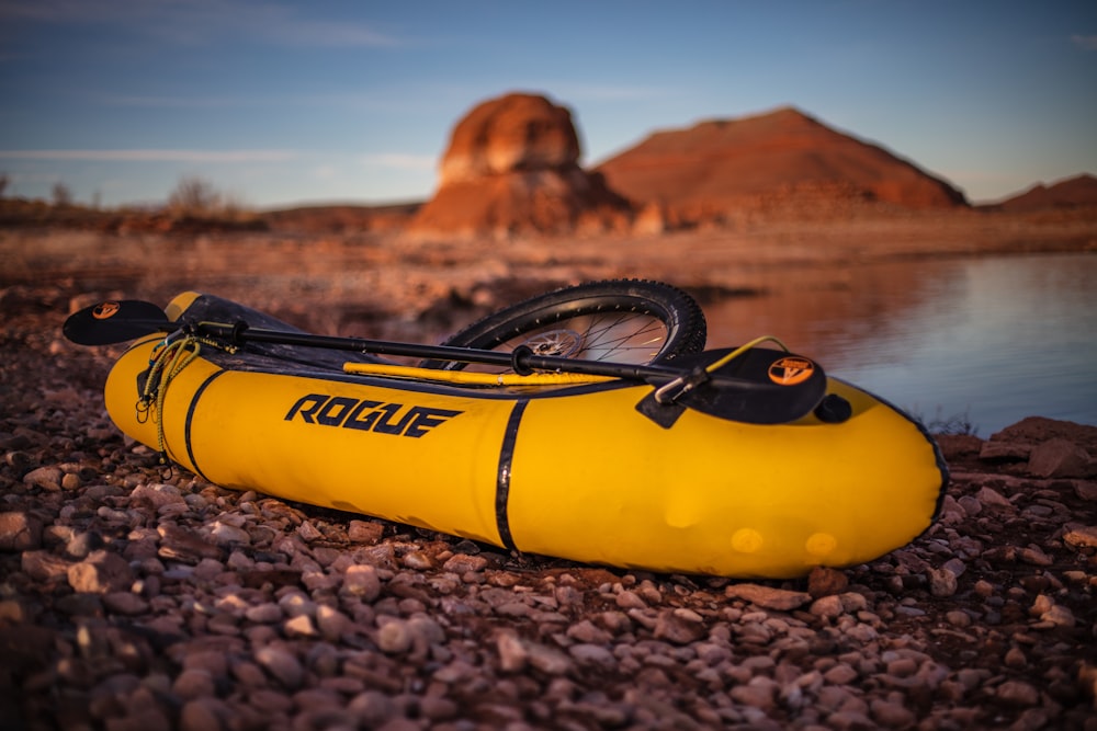 yellow Rogue kayak on shore