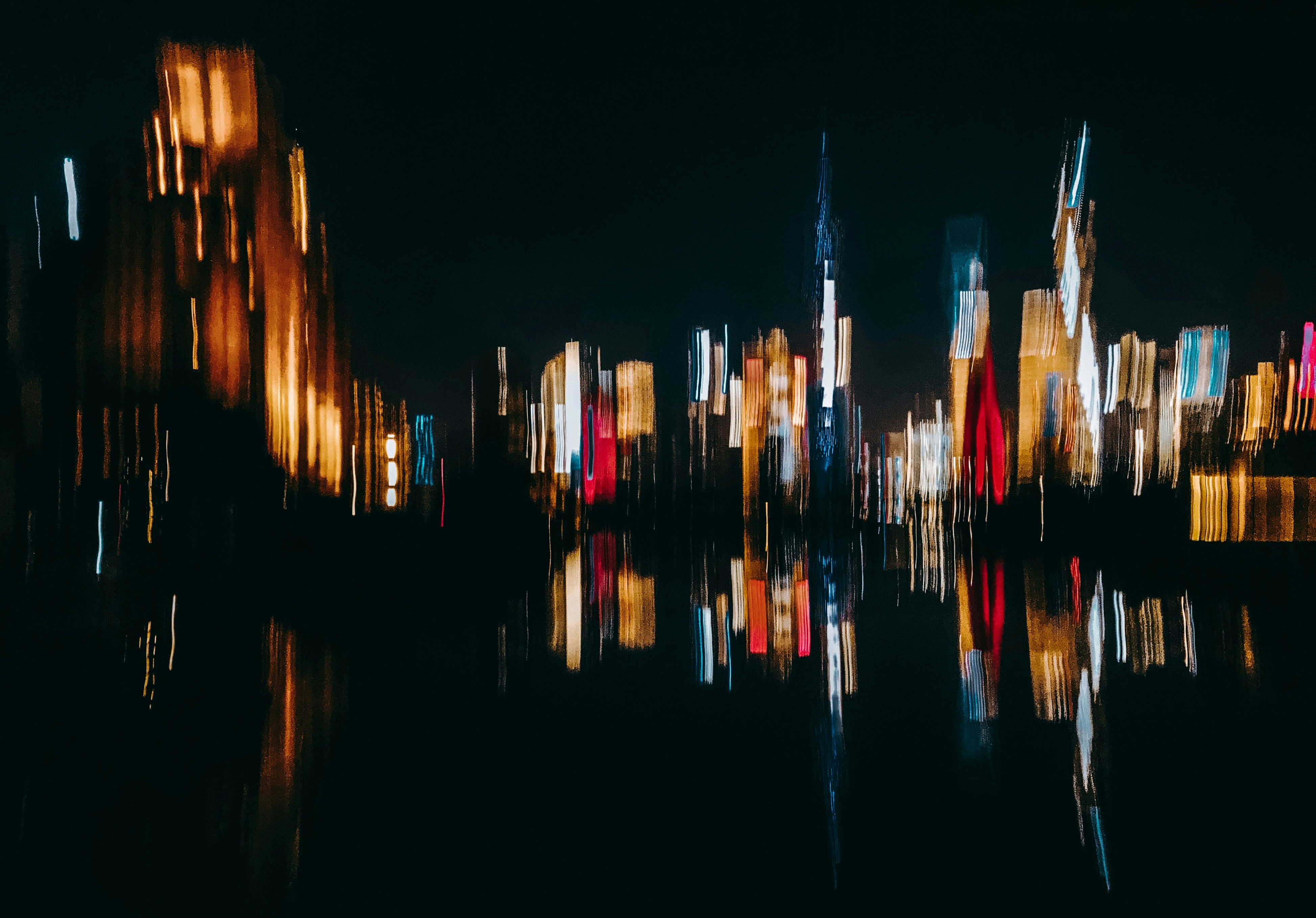 Abstract modern cityscape at night with subtle architectural lines representing security and infrastructure