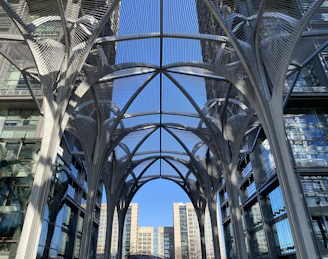 Modern metal and glass canopy installation at a residential property in São Paulo.