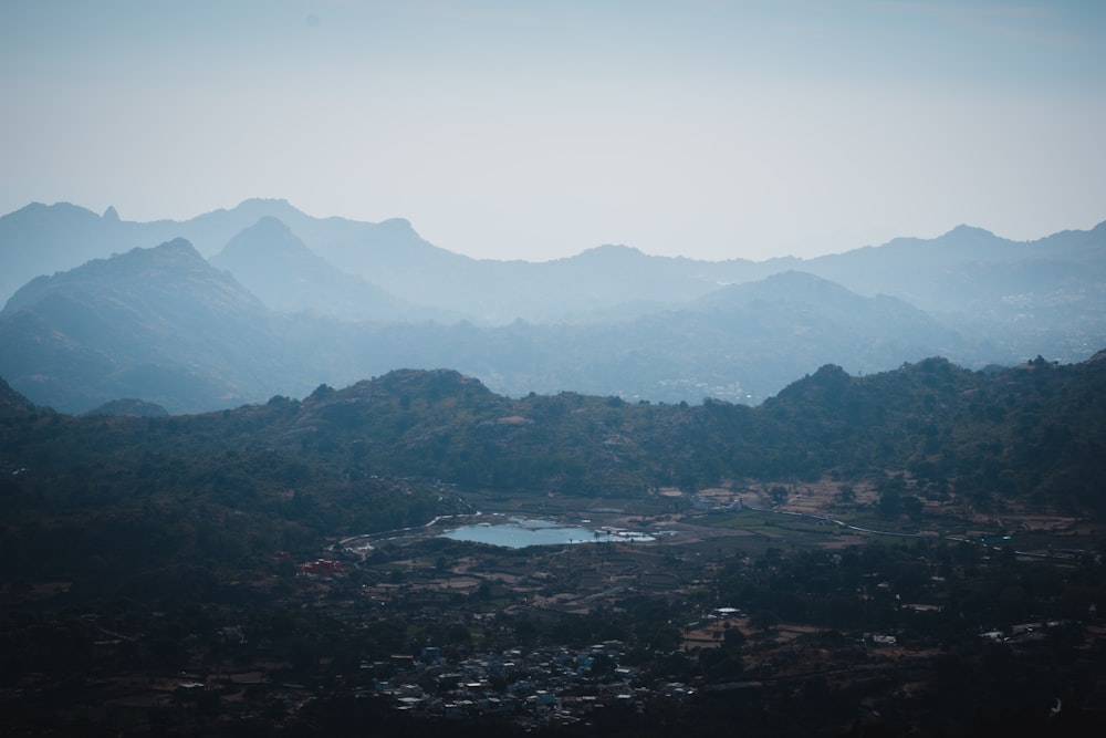 top view of mountains and town under gray sky