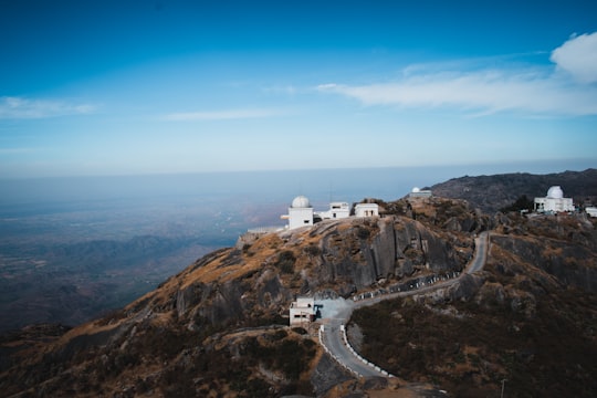 gray road on mountain during daytime in PRL Observatory India