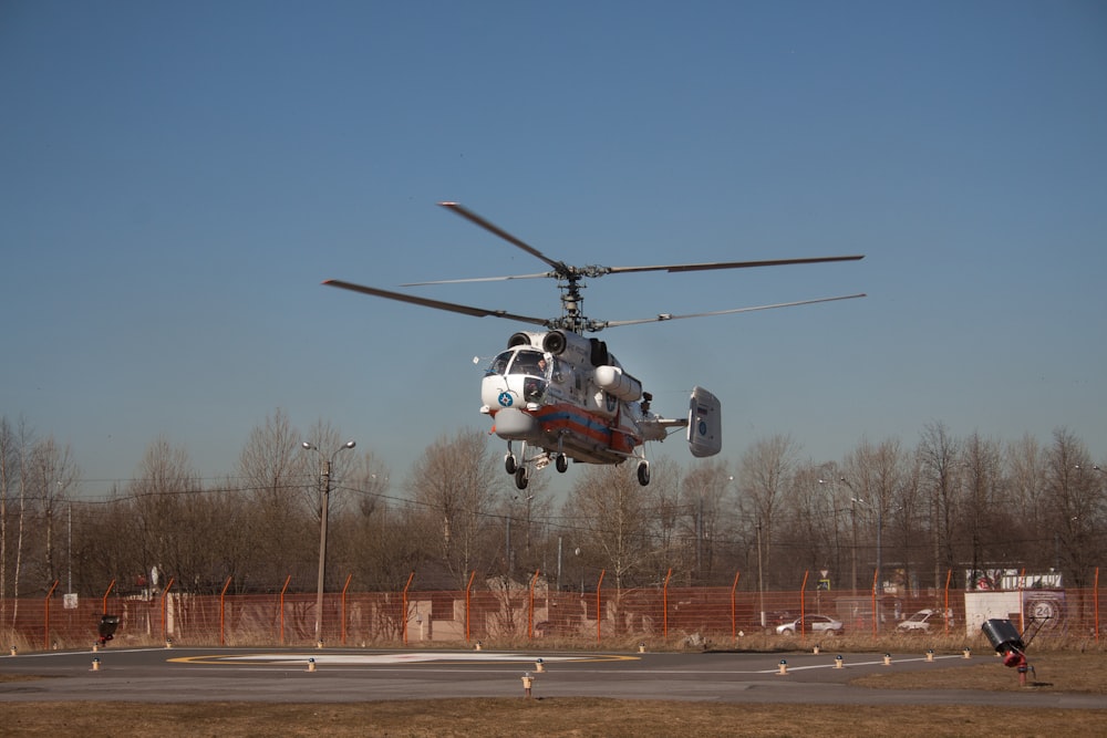 grey helicopter during daytime