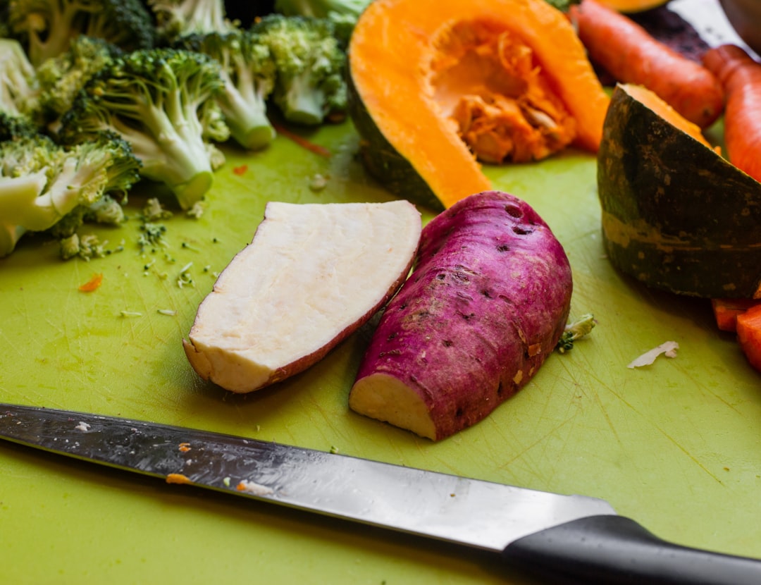 sliced vegetables beside knife